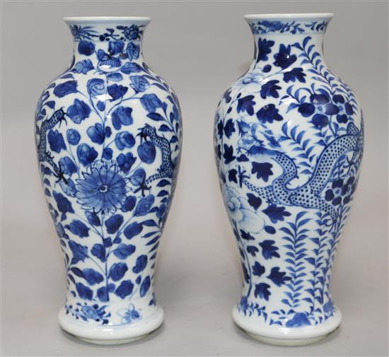 A pair of Chinese blue and white vases 23cm.